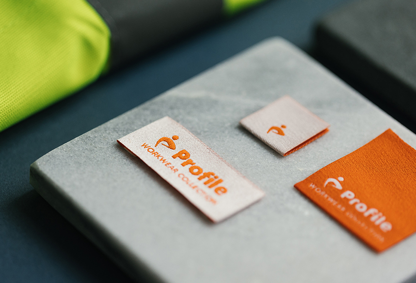 ITL's Profile Woven labels in white and orange - from ITL's Profile Collection 