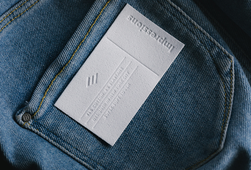 Tactile external embellishment patch in white with debossed copy