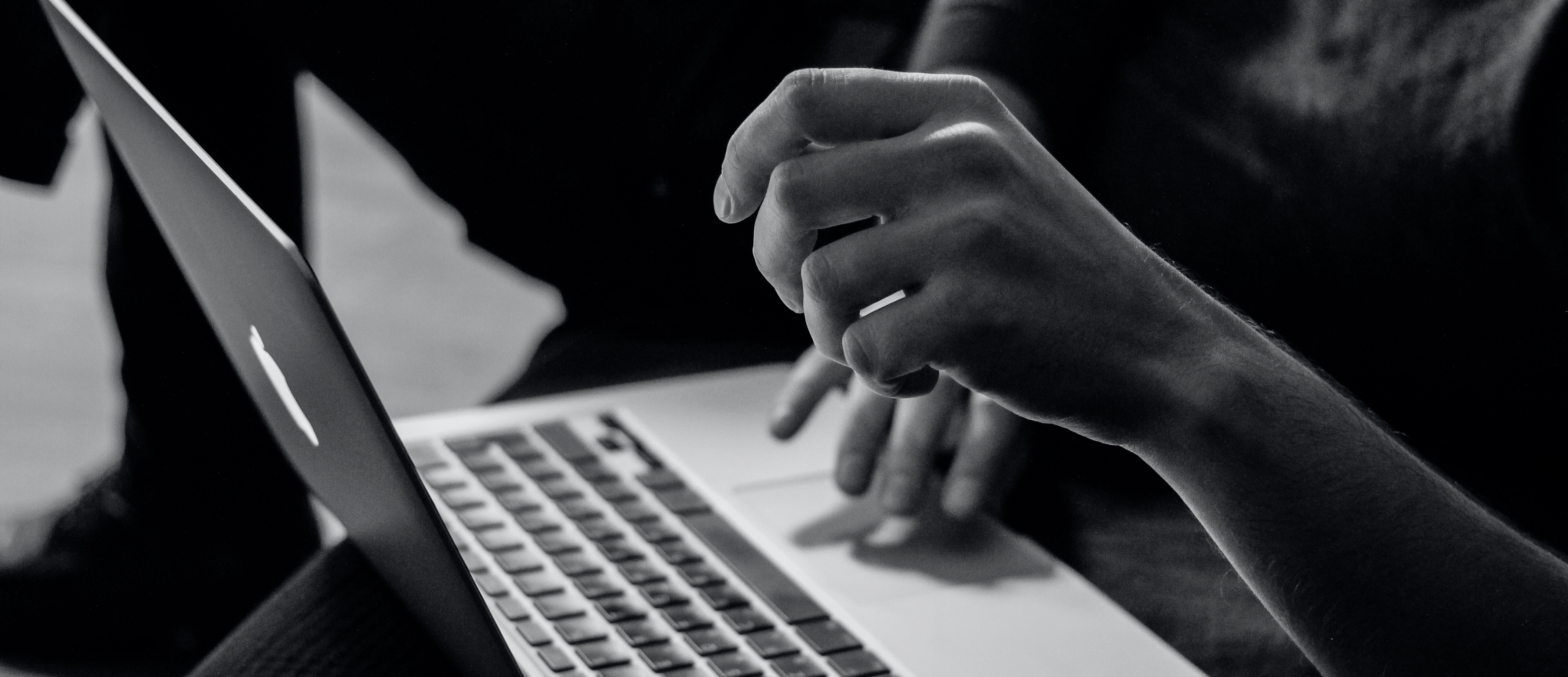 Image of a person on their laptop looking at ITL's website 