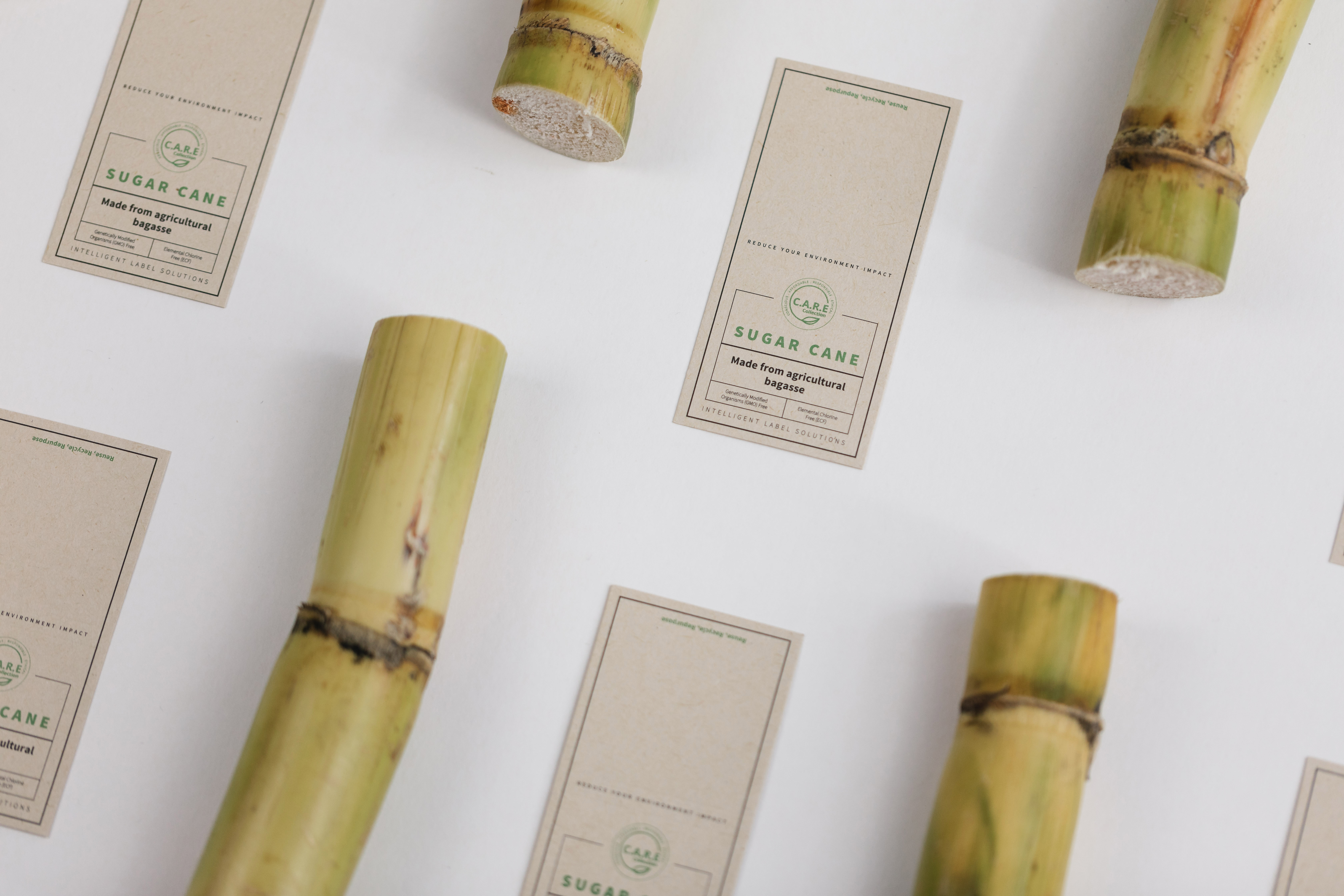 ITL's Sugar Cane swing tickets next to sugar cane from ITL's Alternative Series Collection. 