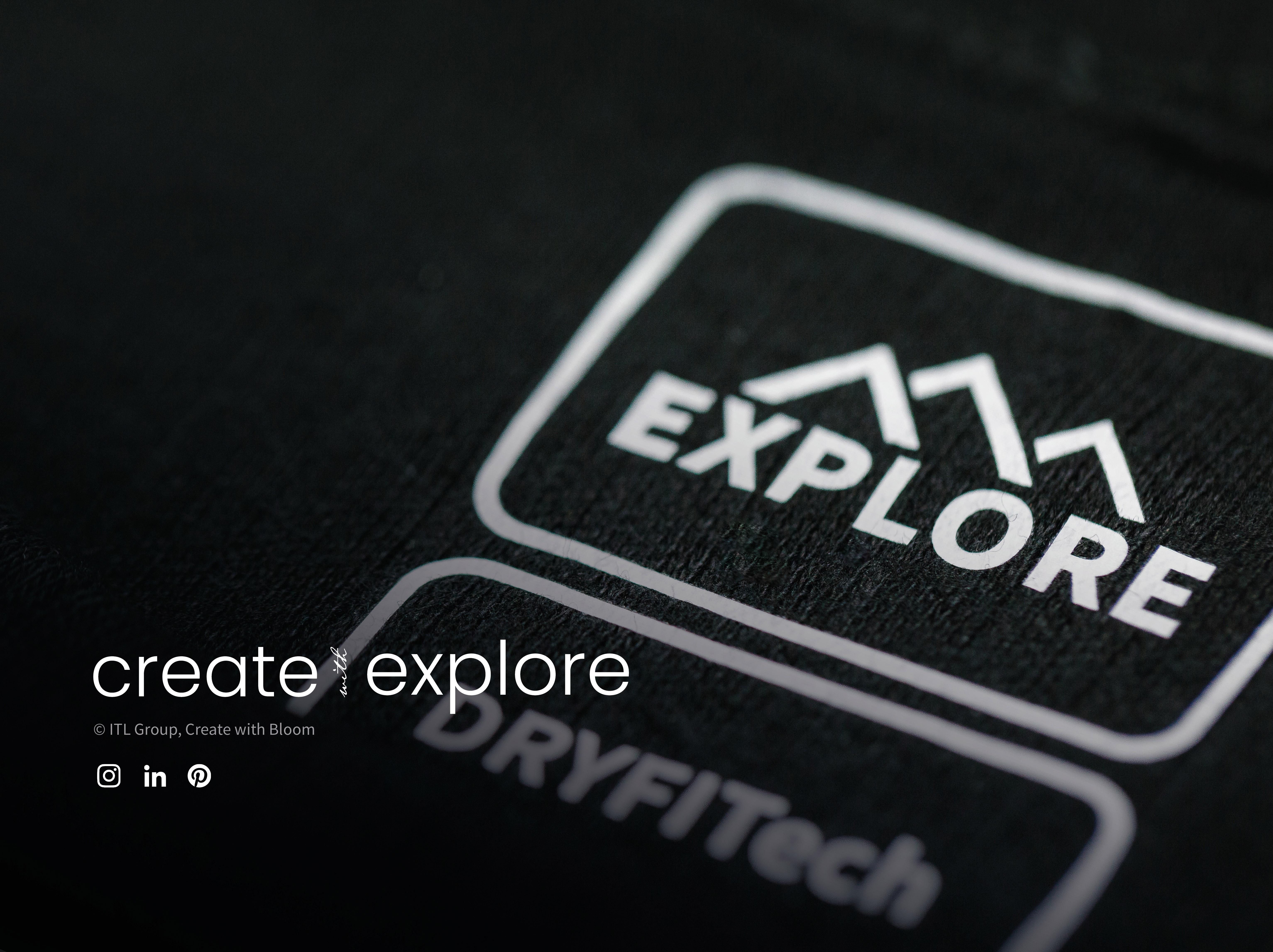 ITL Explore Heat transfers. White transfers on a black top 